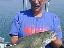 Bernie and a hard-fighting three-pound Fort Peck smallmouth bass.
