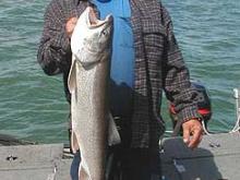 Roger Kellogg of Charles City with a 10 pound lake trout.