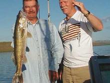 Bob White and Ross Leake of Bozeman, MT with Bob's a 7 pound walleye.