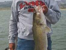 C. B. Schantz of Miles City, MT with a 10 pound walleye caught suspended in the open water.