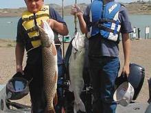 Jake South with a 8 pound northern pike and Ross Ryan with a 6 pound walleye caught during the kids tournament at Hell Creek.