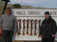 C. B. Schantz of Miles City and myself with a 6, 6, 7, 8, 8 and 10 pound lake trout. walleye.