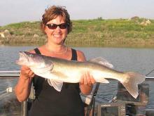 Gina Foster of Billinmgs, MT with a 27.75, 8.32 pound walleye.