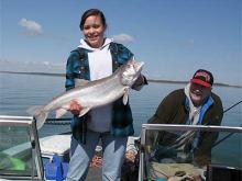 Haley Johannsen, of Minot, ND with a 12 pound lake trout.