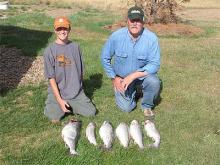 Payson and Jim Lippert of Big Timber, MT with their limit of lake trout.