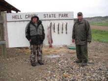 Roger and Bruce Kellogg with a 15 pound northern pike and some 1.5 pound walleyes.