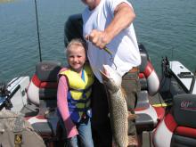 Guy and Morgan Fairchild of Clyde Park, MT with Morgans 6 pound northern pike.