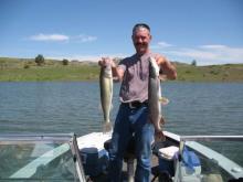 Mark Wollenutg of Billings, MT with a 5 pound northern pike and a 4 pound walleye.