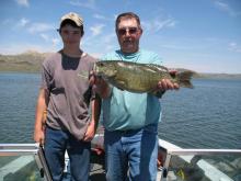 Monte Reder of Miles City, MT with a 5.25 pound smallmouth bass.