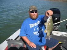 Tracy Roberts of Leoti, KS with a 2 pound smallmouth bass.