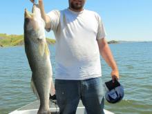 Tyler Trogden of Miles City with a 28.25, 8.84 pound walleye.