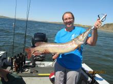 Laurie Carmichael of Goodland, KS with her 39, 17 pound northern pike.