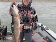 Marilyn Arens of Littleton, CO with a 35 10 northern pike.