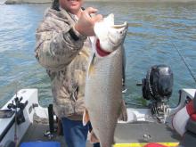 Cory Bollinger of Miles City, MT with a 14 pound lake trout.
