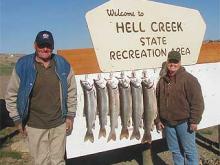 Clinton and Prentise Phipps of Brusett, MT with a 8, 9, 10, 12, 14,and 19# lake trout.