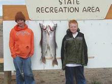 Jim Ensign and Hunter Losing of Miles City, MT with a 10 and 12# lake trout.