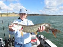 Penny Redli of Columbus, MT with a 9 pound northern pike.