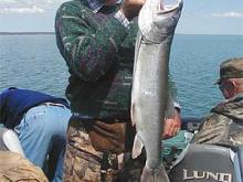 Steve Gilpatrick of Hilger, MT with a 14# lake trout.
