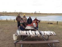Glueckert and Johannsen families with first days catch of 24 lake trout.