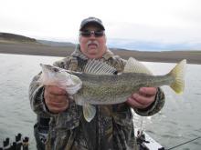 Orrin Dockhan of Gillette, WY with a 22 walleye.