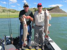 Floyd Stevens and Mike Wood with a double of Northern pike. Floyds is one of his two 40, 29 pound northern pike that day.