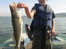Kolton Hensleigh of Miles City, MT with a 24, 5.5 pound walleye.