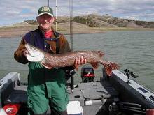 Don Childress of Helena, MT holding a 12# northern pike.