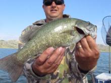 Chris Justice with a smallmouth bass
