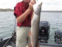 Nora Taylor with a 36', 14 pound northern pike.