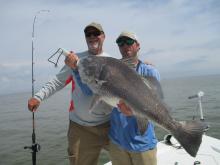 Tom Childress and Guide Johnny Hodge with a 40# black drum.