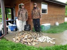 A Dood and Vic Riggs with a two day limit of bluegills for six people also some walleyes and largemouth bass.