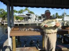 Monte Reder with a Pompano and a catch of sea trout.