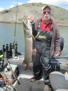 Steve Starnes with a 42", 22 pound northern pike.