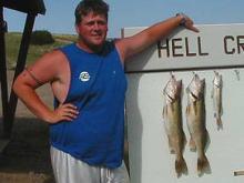Ross Kellogg of Ionia, IA with two 6 pound and a pounder walleyes.