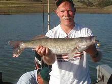 Ross Leake of Bozeman, MT with a 9 pound walleye.