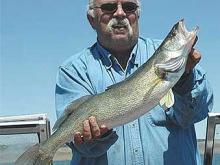 Mark Henckel, of Park City, with a 27-inch, 7.58-pound walleye.