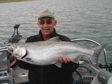 Bernie with a 17 pound Chinook Salmon caught at the dam area.