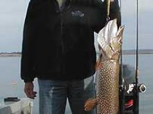Marcus Grinestaff of Billings, MT with a 22 pound northern pike.