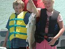 Ross Ryan, Sami South of Jordan, MT and myself with Ross's 5.5 pound walleye.