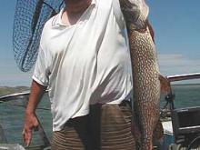 Roger McGlenn of Helena, MT with a 14 pound northern pike.