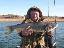 Curt Channing of Eau Claire, WI with a 6 pound lake trout .