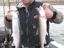 Jeese Gee of Laurel, MT with a 2 pound rainbow and a 2 pound lake trout.