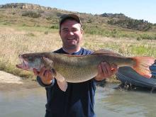 Scott Hemmer of Broadus, MT with a 10.5 pound walleye.