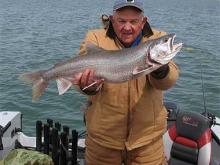 Bobby Brown of Shawnee, OK with a 13 pound lake trout.