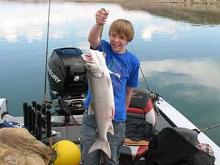 Elieus Vera, of Miles City, MT, with a 10-pound lake trout.