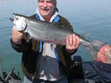 Steve Glueckert of Missoula, MT, with a 12-pound chinook salmon.