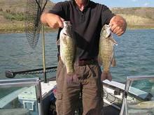 Don Chilress of Helena, MT with a 2.5 and 3 pound smallmouth bass.