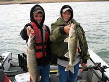 Ross Ryan with a 8 pound northern pike and Eric Berry with a 3.5 pound walleye.  Both boys are from Jordan, MT.