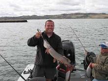 Johan DeBeer of Goodland, KS (South Africa) with a 8 pound northern pike.