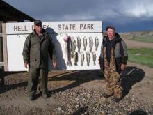 Bruce and Roger Kellogg with a 10, 4 and some 1.5 walleyes and a 1.5 smallmouth bass.